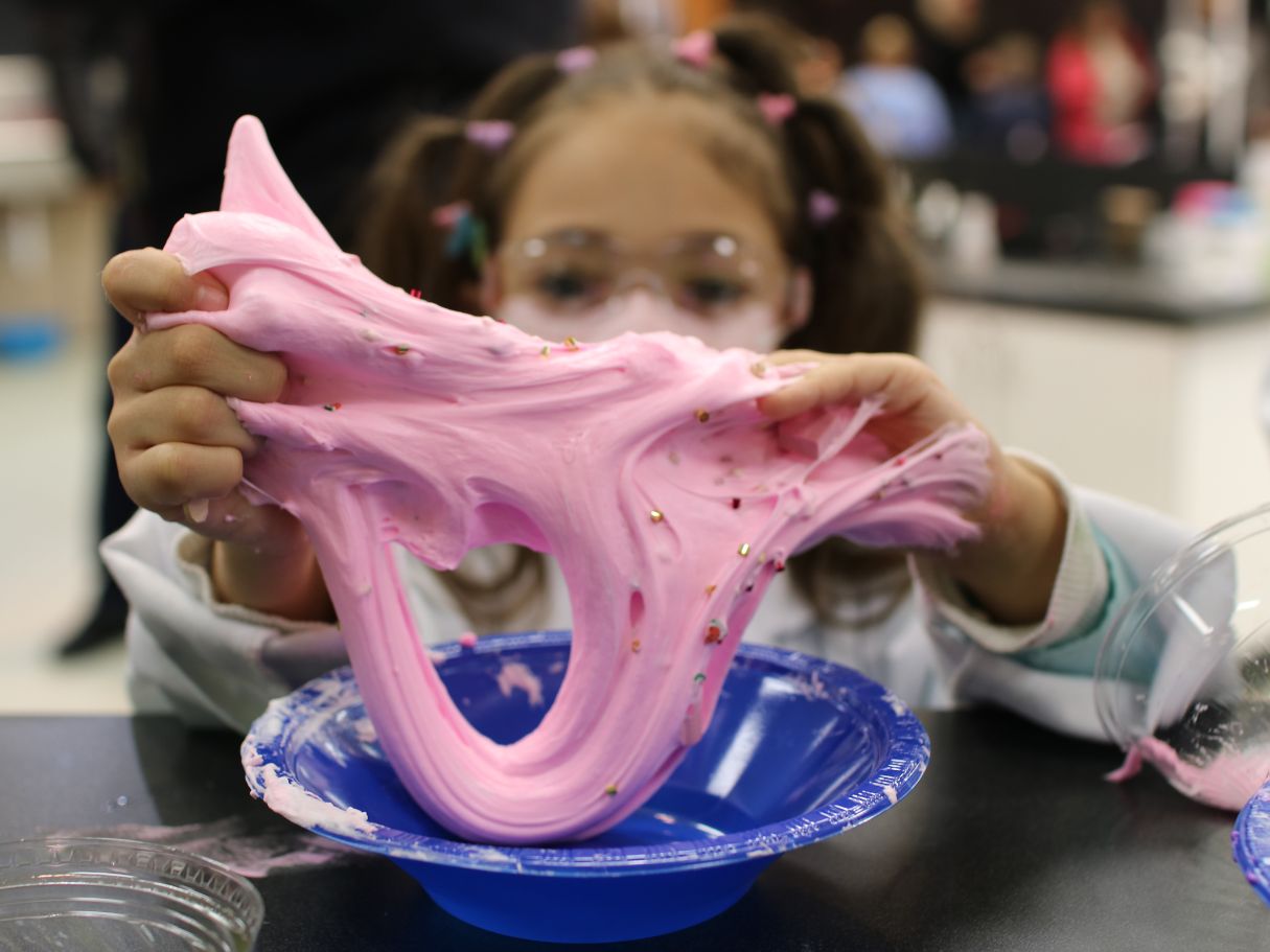Child engaged in hands-on slime making at Funtastik Labs in Houston, a leading destination for slime and science fun